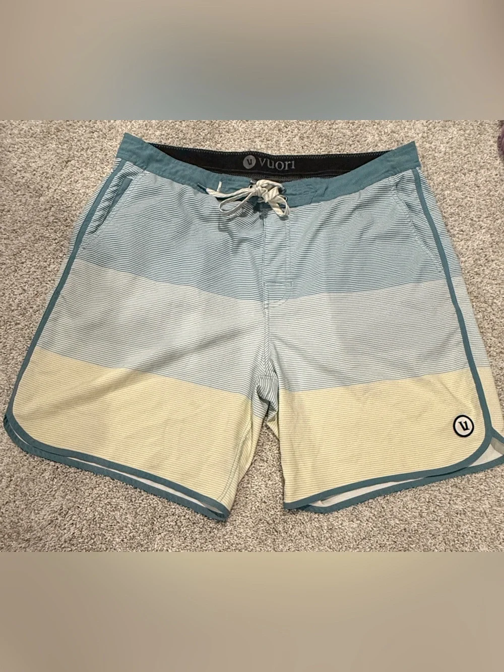 Vuori Men's Striped Board Shorts size 36. Inseam 8 inches.